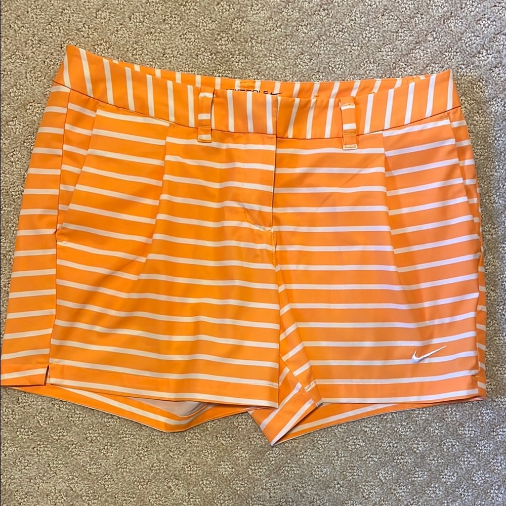 Nike Bright Orange Athletic Shorts with White Stripes